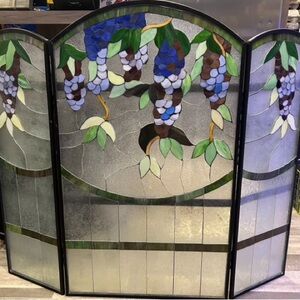 Stain glass fireplace screen. The perfect touch to every home.